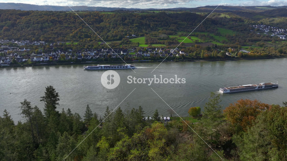 Barges are gliding along the Rhine River in Germany. Rhineland-Palatinate or Rheinland Pfalz Region, Deutschland, Aerial