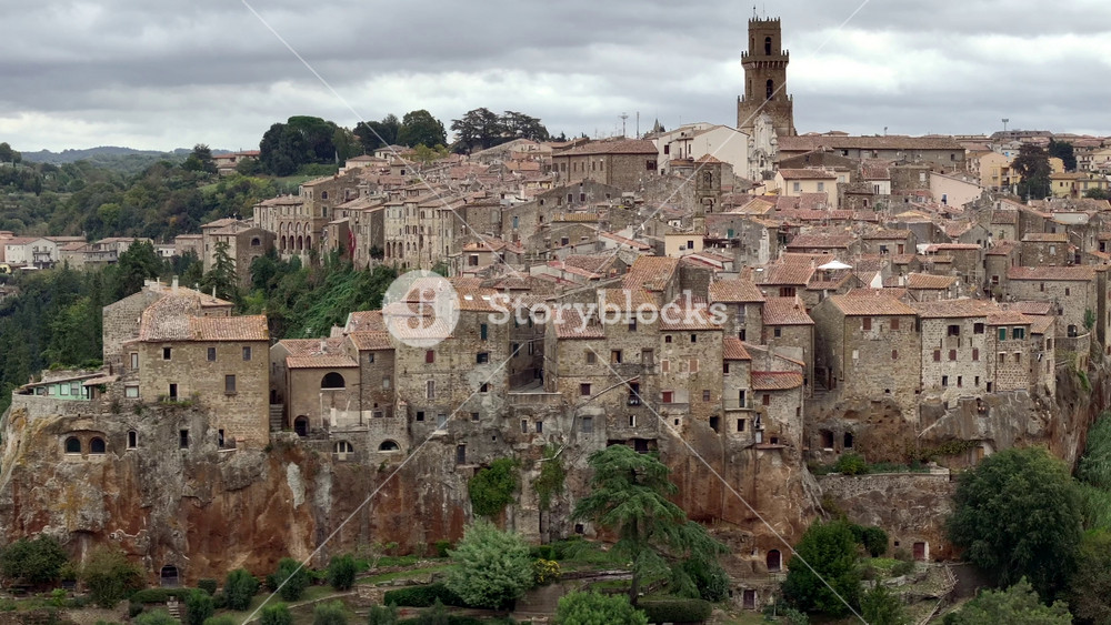 Aerial Drone view of hilltop Medieval town of Pitigliano, Tuscany in Cloudy Weather, with Valdorcia and old buildings