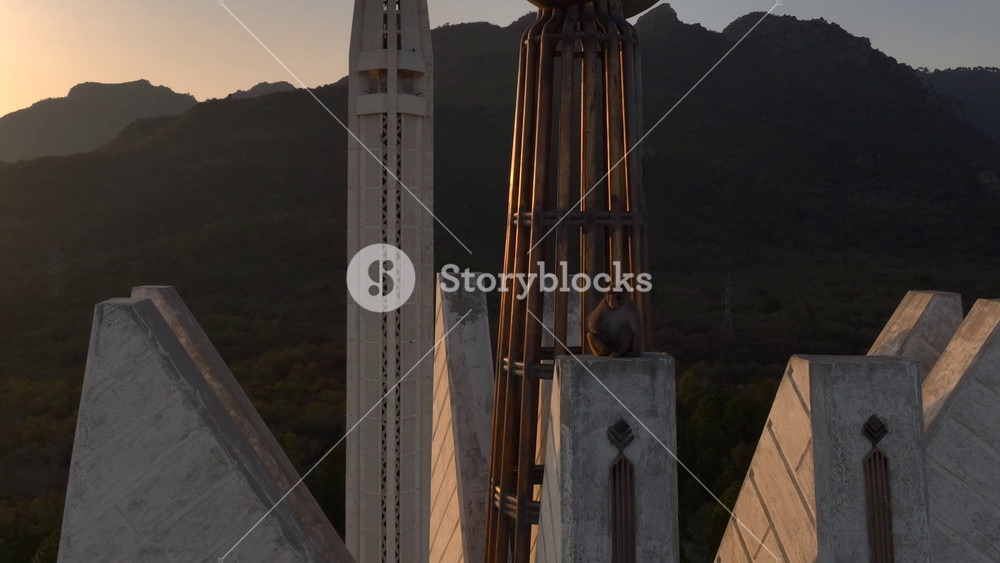 Close up of Crescent on Top of Faisal Masjid in Islamabad at Sunset time. Monkeys at Largest Mosque in Pakistan, Aerial