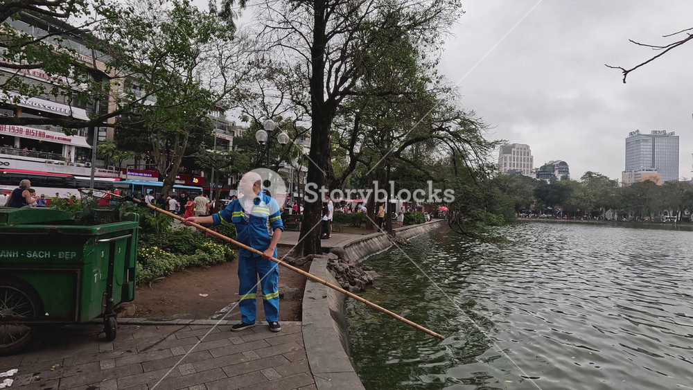 Lakeside Cleanup Activity in Progress Moment - Stock Image SBI ...