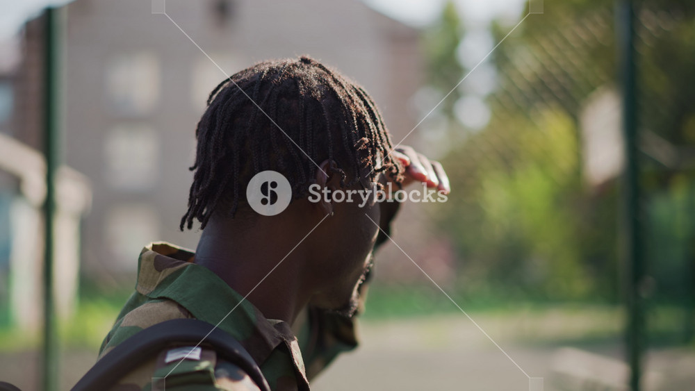Urban Patrol Conducted By Camouflaged Soldier, Soldier In Camouflage Surveys Surroundings During City Patrol, Scene Capturing Soldier In