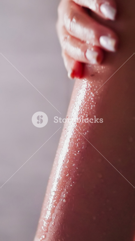 Woman peels skin with scrub in shower cabin closeup. Elegant lady cleans body skin with natural cosmetic product in bathroom. Enjoying