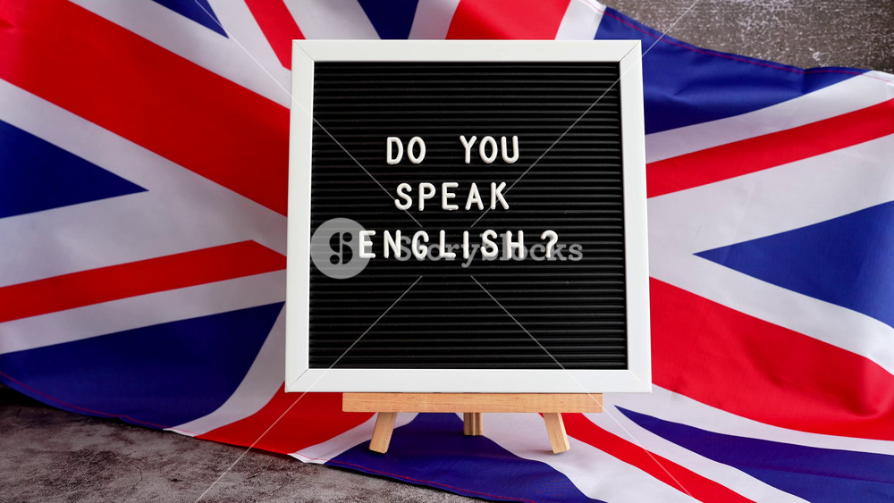 Message DO YOU SPEAK ENGLISH on background of Great Britain UK flag. British national flag with concept of High university college education