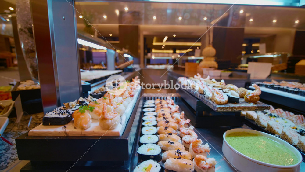 Japanese food self-service luxury hotel in Tunisia. All-you-can-eat buffet during lunch, dinner time. Resort restaurant. All inclusive. Buffet food. Self-service restaurant. Self service meals.