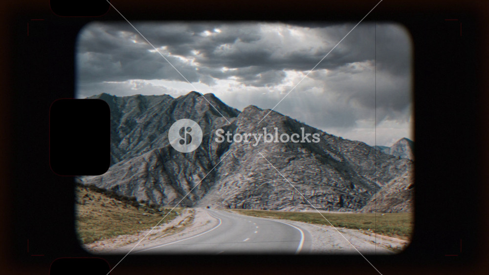 Retro photo camera screen with road of Chuya highway in Altai, Siberia, Russia. Beautiful summer nature landscape at during daytime