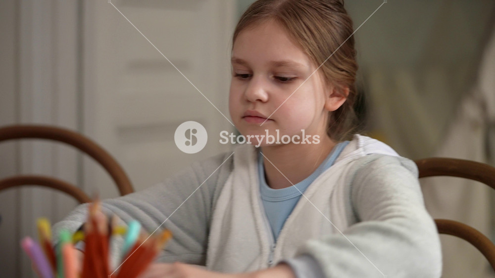 White girl concentrating on drawing colorful sketches pencil pot in foreground, careful lines and shading, home art practice, youthful