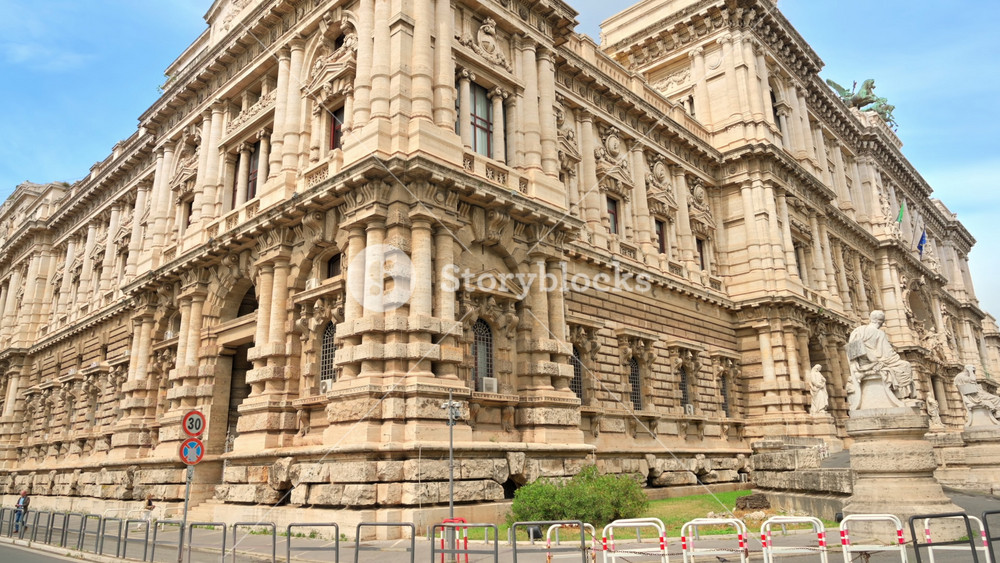 ROME, ITALY - JUNE, 2022: Supreme Court of Cassation located in the city center, facade with sculptures, street in front of it