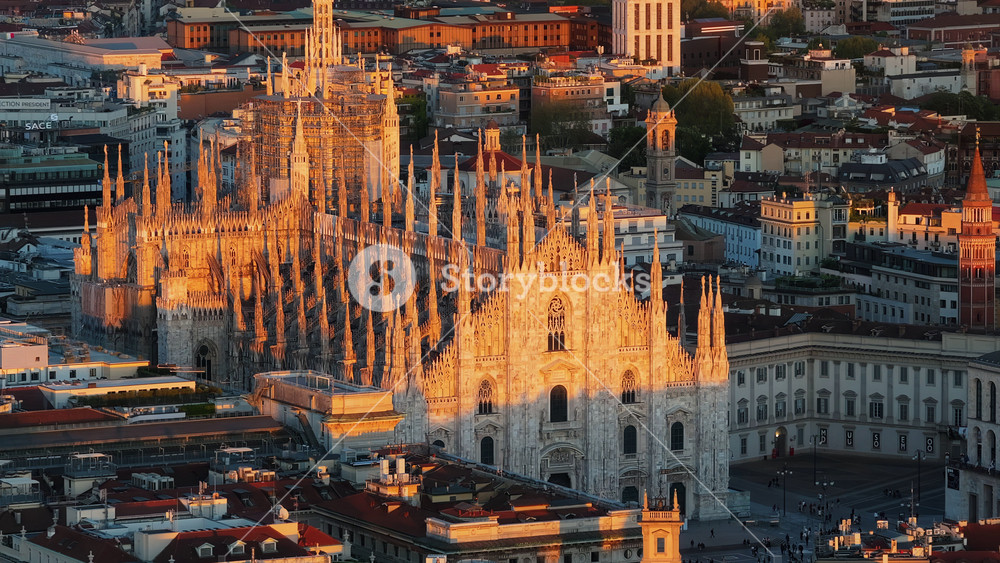 Aerial drone view of the Metropolitan Cathedral-Basilica of the Nativity of Saint Mary on a sunny day, Milan Italy