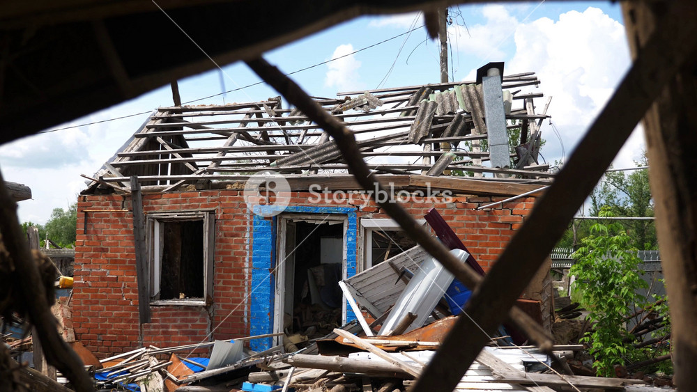 View to destroyed residential buildings at Kharkivska oblast. Ruined houses after bomb attacks on ukrainian territory from russia army. Consequences of russian invasion of Ukraine. Slow mo