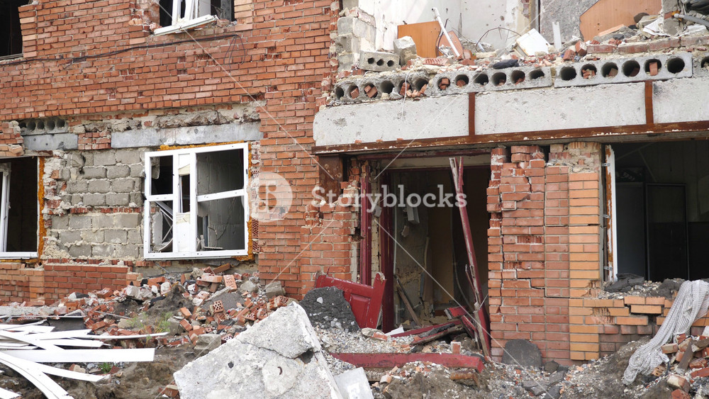 View to destroyed residential buildings at Kharkivska oblast. Ruined houses after bomb attacks on ukrainian territory from russia army. Consequences of russian invasion of Ukraine. Slow mo
