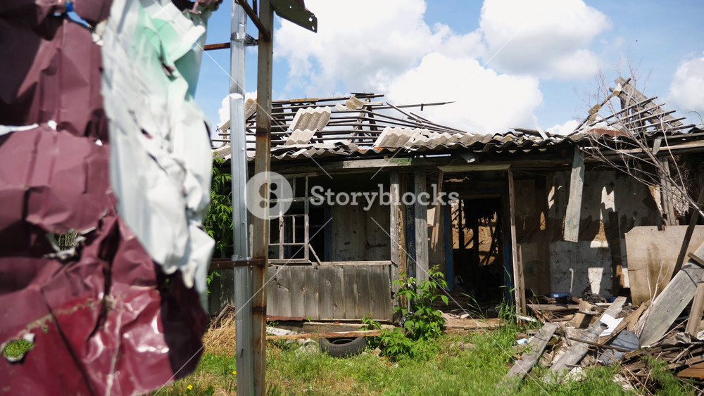 View to destroyed residential buildings at Kharkivska oblast. Ruined houses after bomb attacks on ukrainian territory from russia army. Consequences of russian invasion of Ukraine. Slow mo