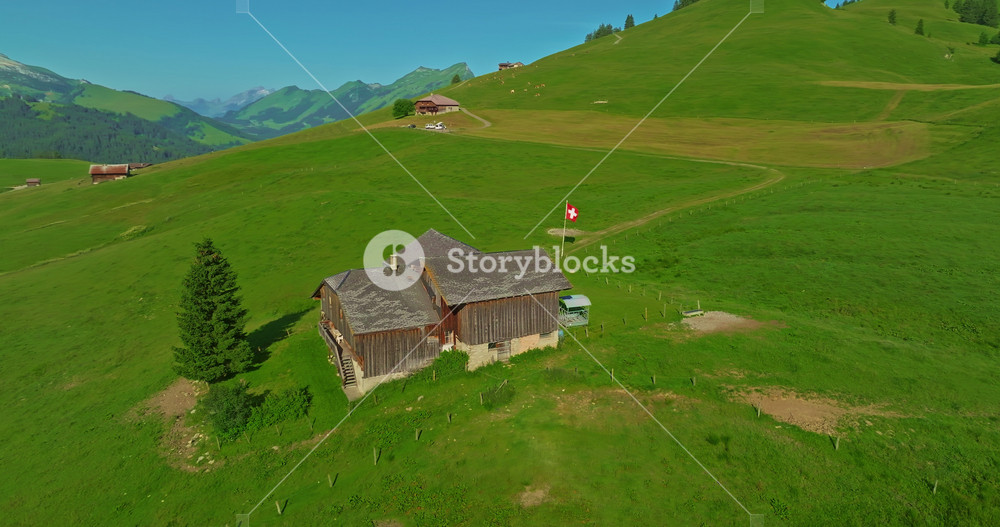 Incredible mountainous terrain of the Swiss Alps. Pristine stunning green Swiss nature in summer. Aerial view of the such an amazing view of