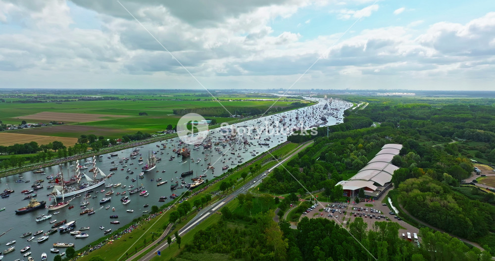 Aerial view of Sail Amsterdam 2025, Sailing Parade in Amsterdam in August 2025. Many ships and boats of different sizes participate in the