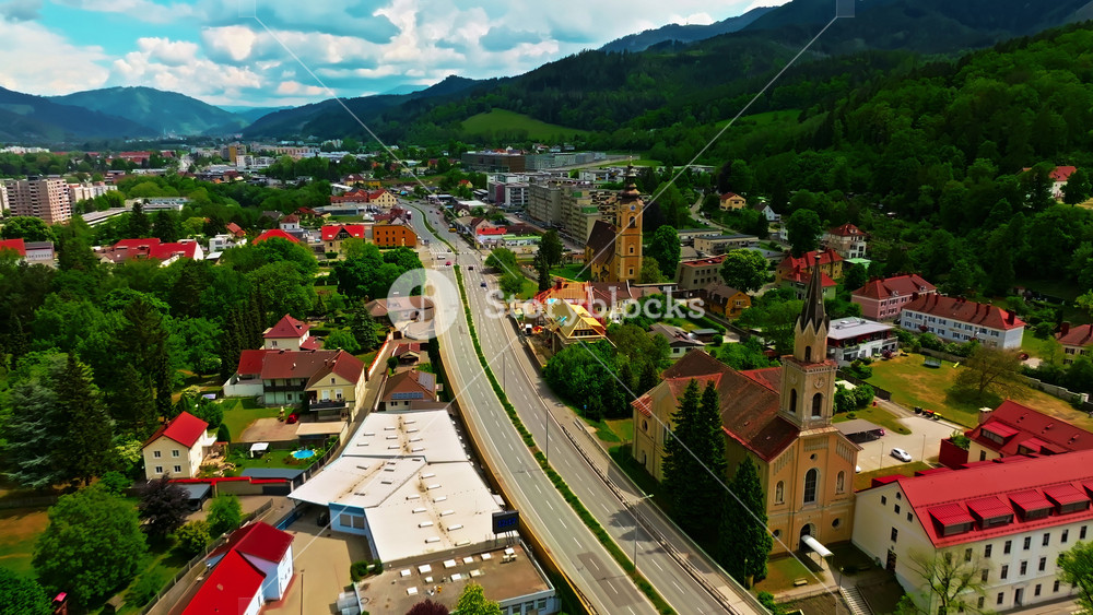 Aerial view of beautiful industrial town of Leoben in the mountains in central Austria with heavy industry and metallurgy