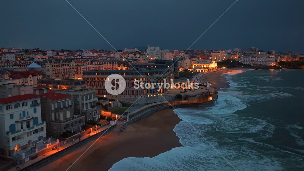 France, Biarritz, 08 November 2024: Biarritz large aerial view of the main beach and Biarritz city at night France. View of facade of Hotel Sofitel Biarritz Le Miramar Sea