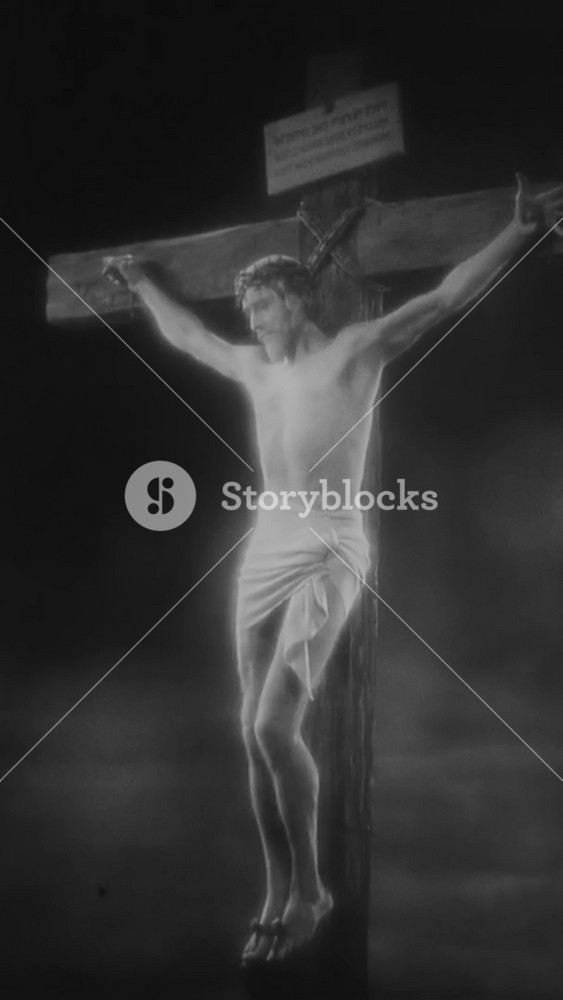 ISRAEL - 1927, in this silent epic film, a Roman soldier roughly pulls the mother of a crucified thief away from his cross. She ends up with Mary who stands at Jesus's cross. Mary embraces her.