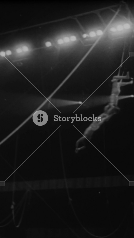 1957 - The Flying Alexanders perform on the trapeze among other aerialists at a Ringling Brothers Circus performance at Madison Square Garden in New York City, New York.