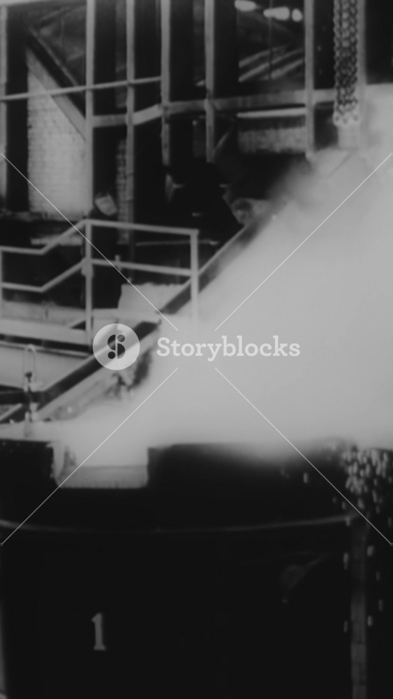 1943 - Industrialist Henry J. Kaiser oversees the first furnace tapping at one of his steel mills being used for the war industry.