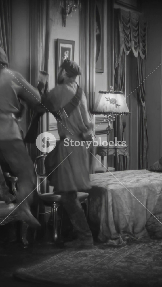 RUSSIA - 1927 - in this silent drama, Bolsheviks storm an aristocratic villa and shoot at the enemy from the windows. A trapped woman hides while soldiers arrive and fight their way to the house.