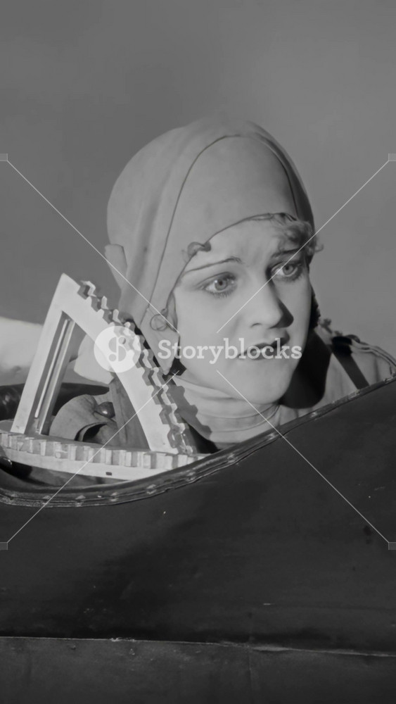DENMARK - 1929 - in this silent comedy, a pilot crawls on the wing of his sports plane to save a pet rat, but he falls and opens his parachute, leaving his female passenger alone in the plane.