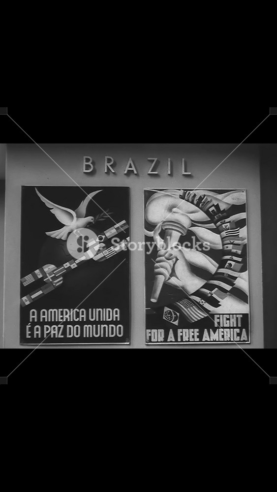 1940s - An outdoor gallery at Rockefeller Center in New York City is dedicated to propaganda posters and crests of the United Nations.
