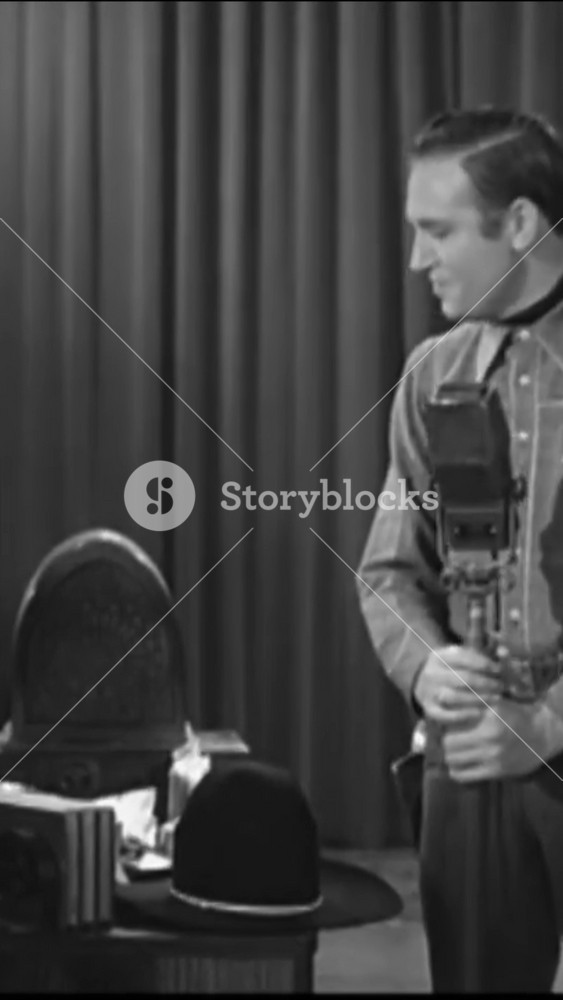 1937 - In this dramatic American Western film, a cowboy pretends to be a conductor to help and audience and group of salesman sing together in harmony.