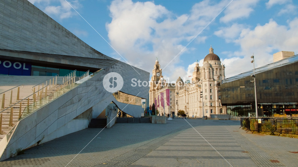 LIVERPOOL, United Kingdom, circa 2021 - Sweeping view revealing the Royal Liver Building and the new Museum of Liverpool in Liverpool, England, UK, opened in 2011