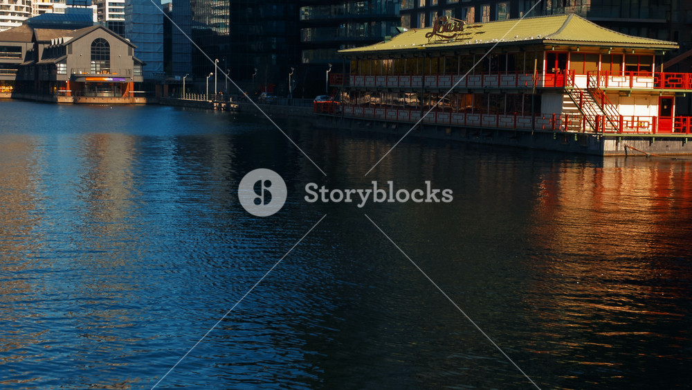 LONDON, United Kingdom, circa 2019 - Wide shot of the Canary Wharf and Millwall Dock in London. This business district that includes apartment and office towers