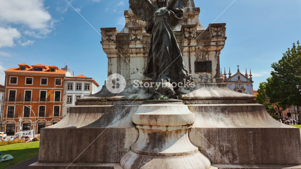 PORTO, Portugal, 16 June 2025 - The Statue of Infante Dom Henrique represents Prince Henry the Navigator clad in armour with sword at rest overlooking Infante Square in Porto, Portugal