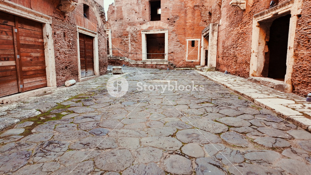 The ruins of Trajan's markets, or Mercati di Traiano, facing the Imperial Forums and the Altare della Patria, Rome, Italy, the first shopping mall in the world