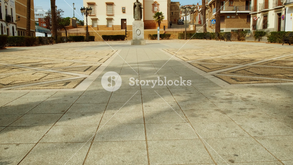 HUELVA, Spain, 18 OCTOBER 2023 - Plaza San Pedro, and the Parroquia Mayor de San Pedro, Huelva, Andalucia, Spain, a blend of daily life and religious architecture