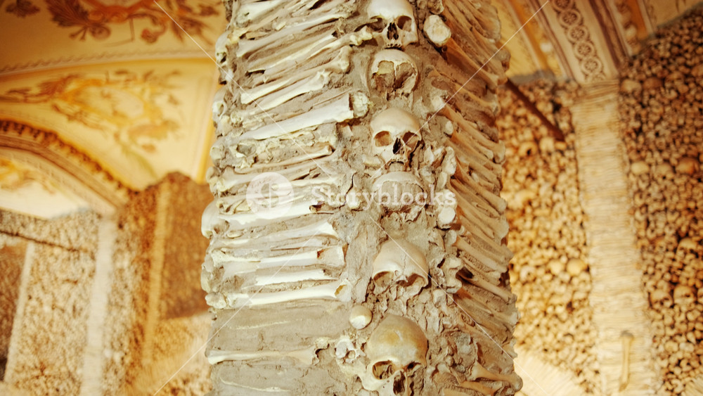 EVORA, Portugal, circa 2022 - Revealing the Chapel of Bones, a small interior chapel located next to the entrance of the Church of St. Francis in Evora, Portugal