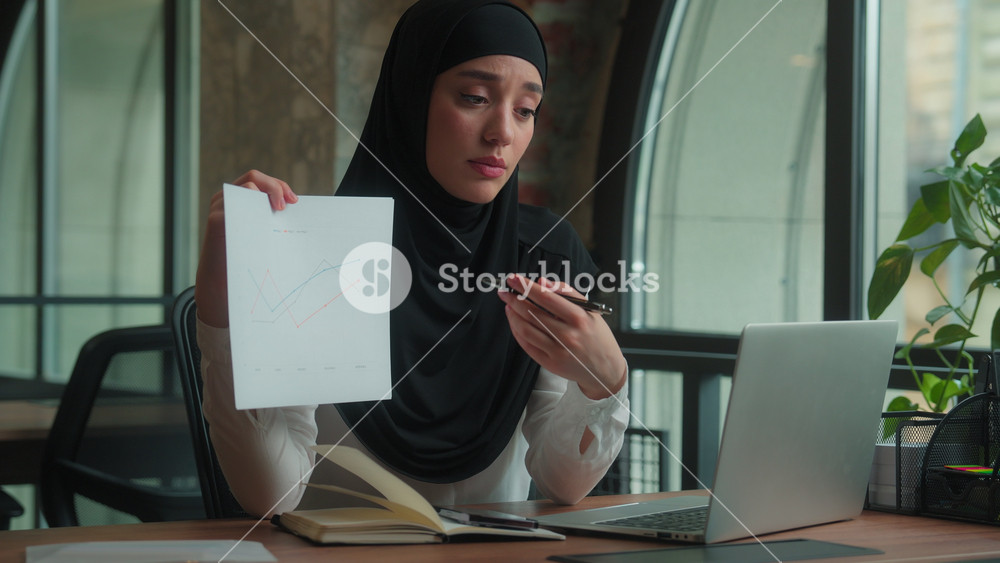 Female architect designer business analyst sad upset Arabian muslim islamic woman girl hijab businesswoman video call online conference