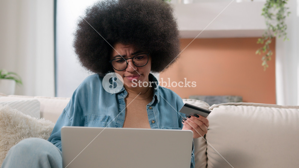 African American woman angry girl frustrated with shopping problem payment reject online credit bank card trouble failure internet
