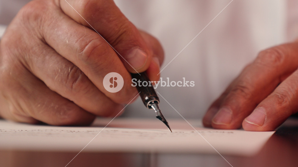Close up old male hand holding fountain pen writer writing letter man paper business calligraphy businessman unrecognizable deal signing