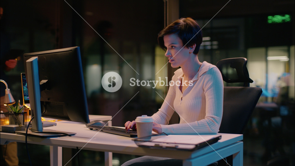 Business man woman cooperation in night office businessman businesswoman argue conflict online trading computer work Caucasian colleagues