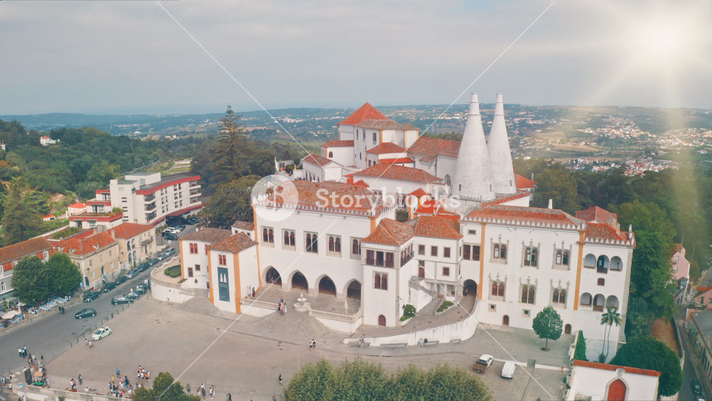 Top view of National Palace in Sintra Portugal white architect towers red rooftops in city traveling abroad vacation trip tour travel