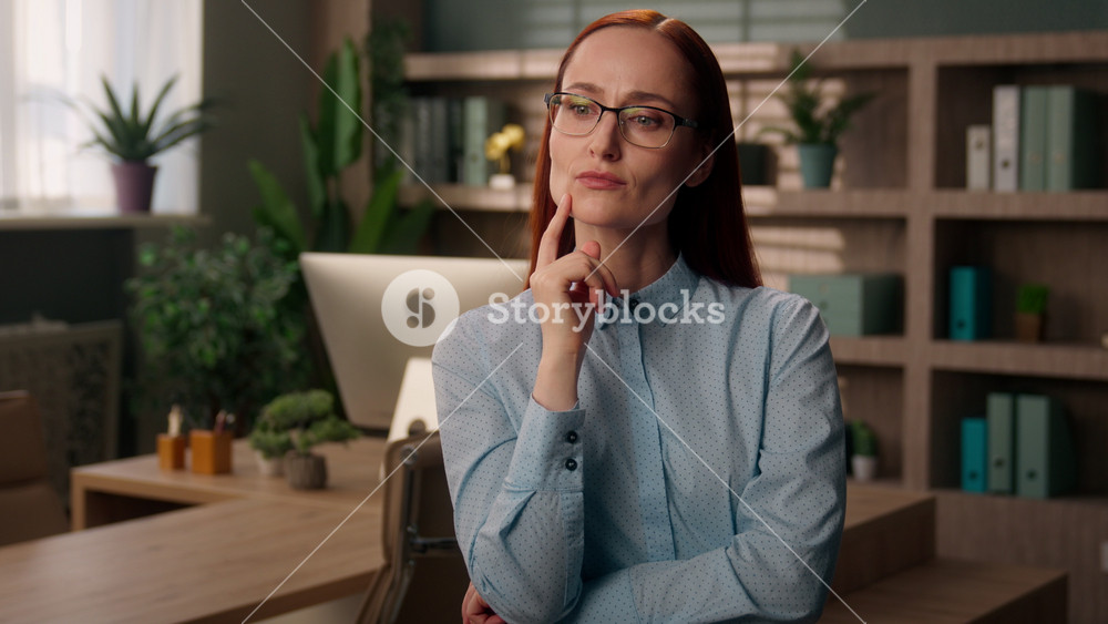 Thoughtful Caucasian business woman thinking idea inside office pensive female planning solution businesswoman glasses employer girl ponder