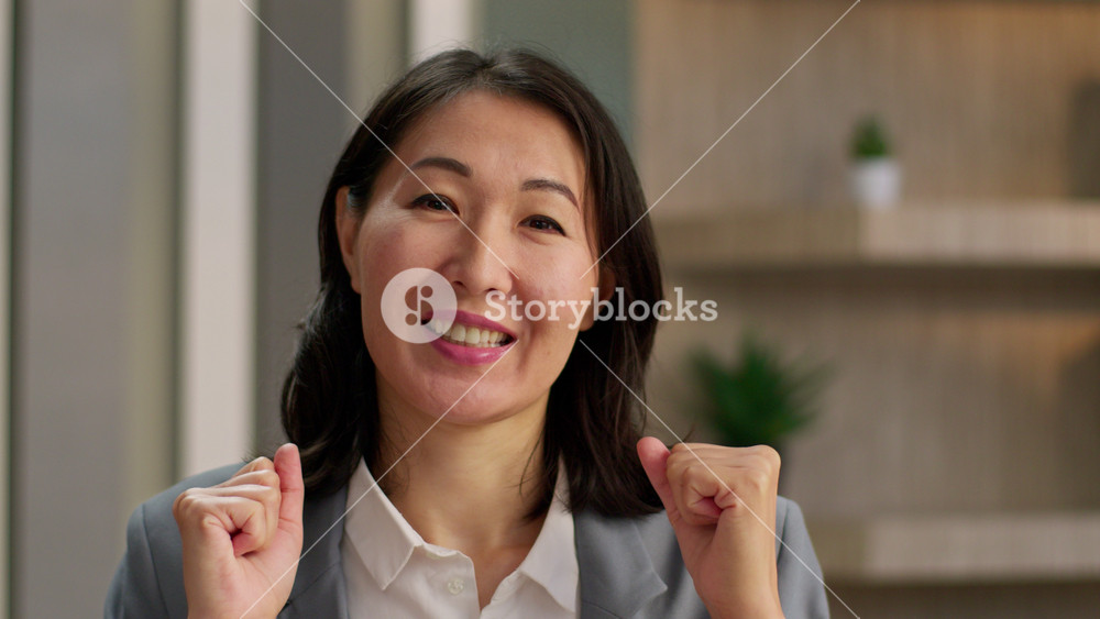 Happy woman Asian chinese korean japanese businesswoman joyful cheerful dancing celebrate female employer office manager investor smiling
