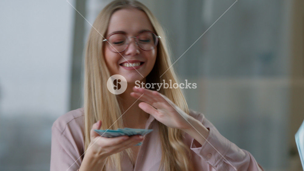 Portrait successful laughing Caucasian business woman throwing money rain in air businesswoman female girl entrepreneur manager throw