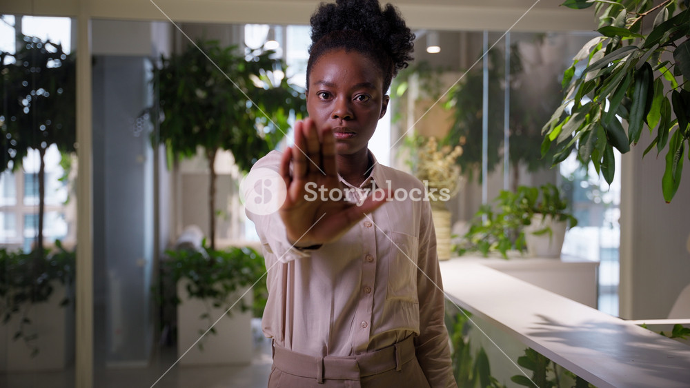 African American business woman confident businesswoman showing hand stop gesture displeased female in office ethnic girl employer leader