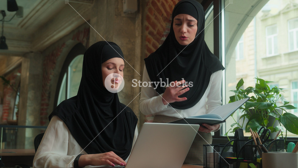 Muslim mentor leader businesswoman consult help worker teach corporate education advice mentoring islamic Arabian girls in hijab women