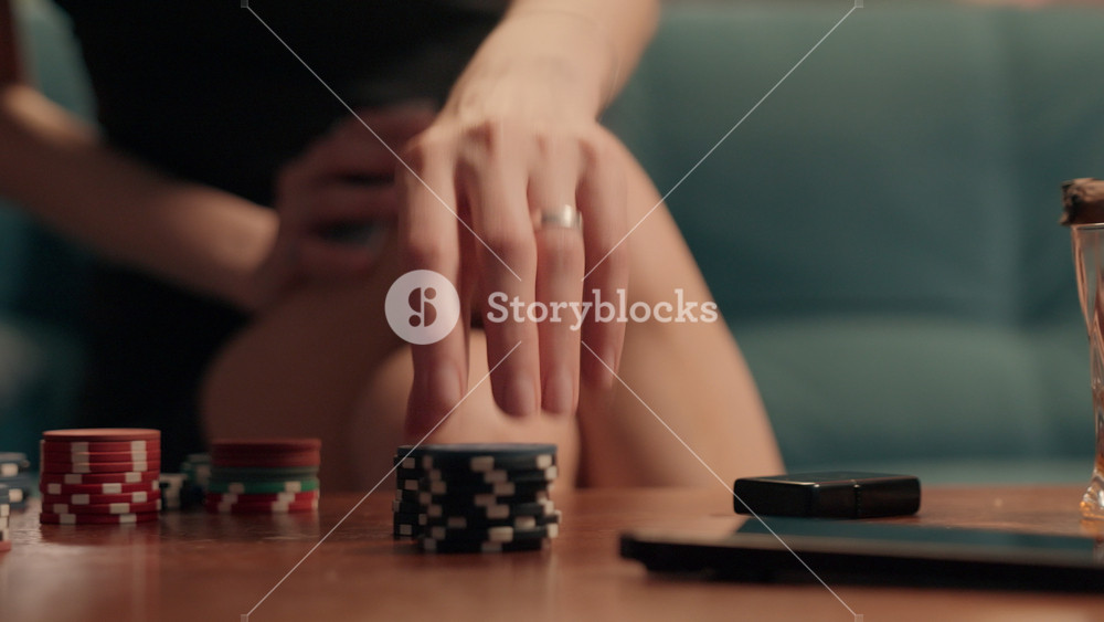 Close up unknown couple man woman playing poker at home betting chips cards game Caucasian players two gamers blackjack girl female play
