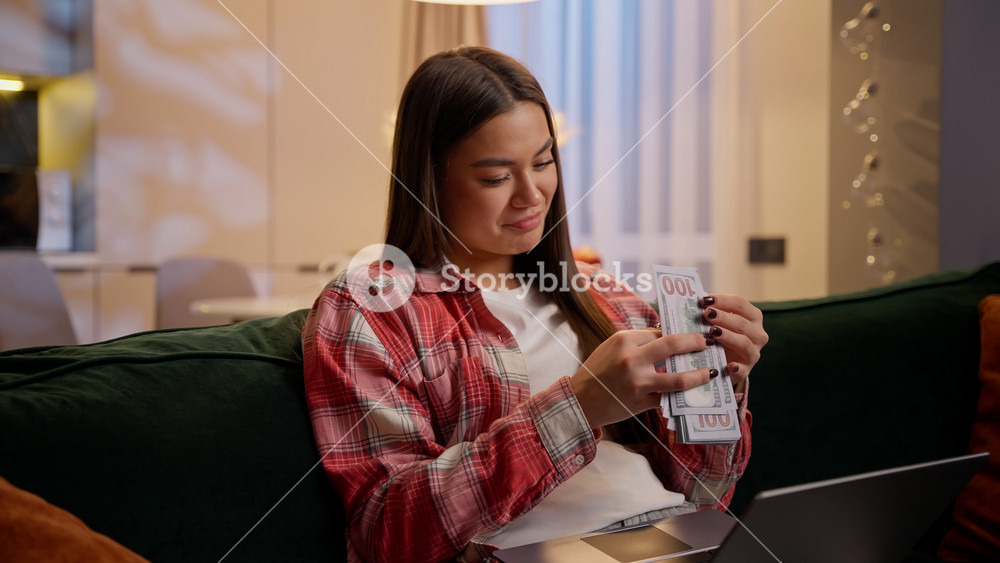 Rich woman Caucasian girl successful businesswoman counting money dollars wealth female count cash finance currency win online betting money