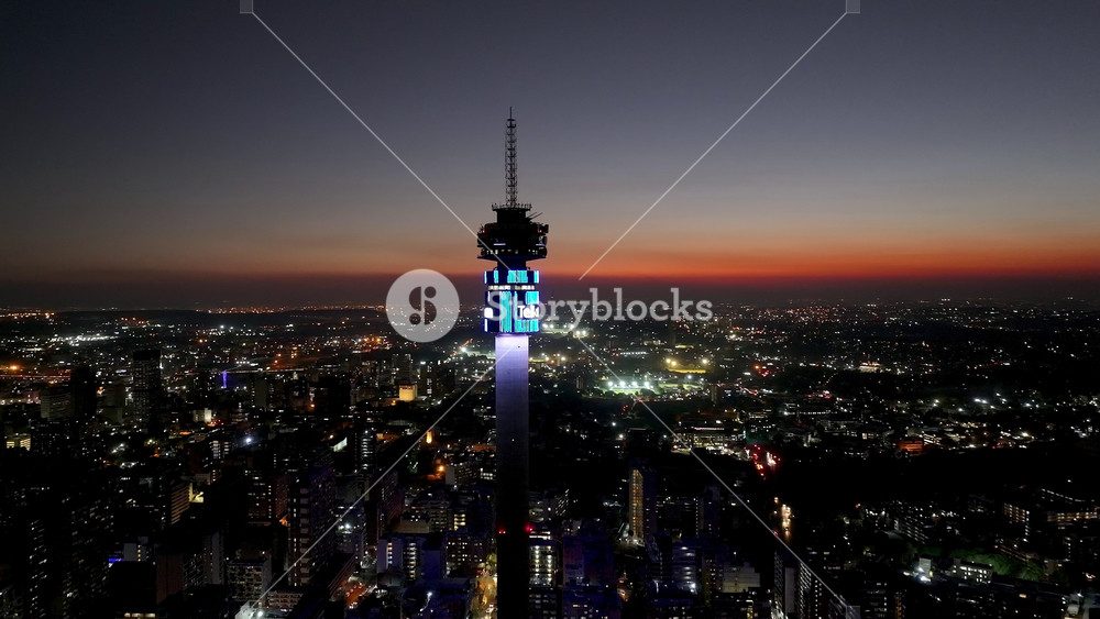 Johannesburg, Gauteng, South Africa - 5.26.2025 - Telkom Tower At Johannesburg In Gauteng South Africa. Sunset Skyline. Bustling Telecommunication Tower In The Busy Avenue.