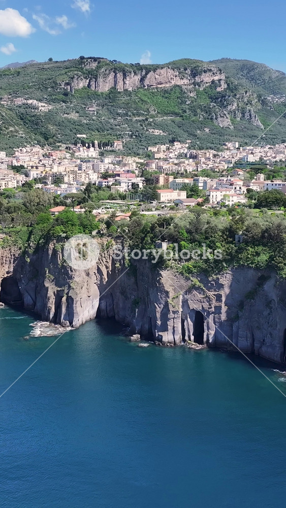 Sorrento Coast In Sorrento Naples Italy. Turquoise Ocean Waves Gently Crashing On Tropical Beach. Island Life Skyline Season Stunning. Island Life Waterfront Shore. Sorrento Naples.