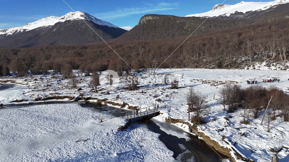 Patagonia Skyline In Ushuaia Tierra Del Fuego Argentina. Birds Eye View Of Peaceful Mountains Valley And Forest Trees. Snow Fall Lake Patagonia Landscape Frozen. Patagonia Landscape.