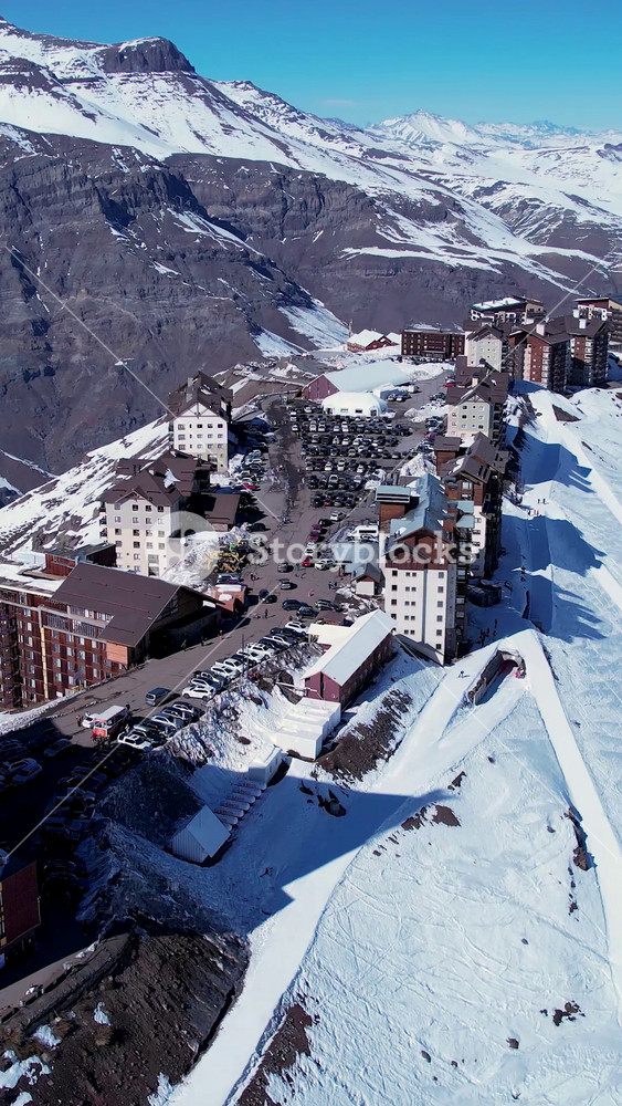 Nevado Valley Ski Station In Andes Mountains Santiago Chile. Chair Lift Transporting Skiers And Snowboarders. Nature Travel Snow Covered Forest Trees. Landmark Snow Covered Aerial View.