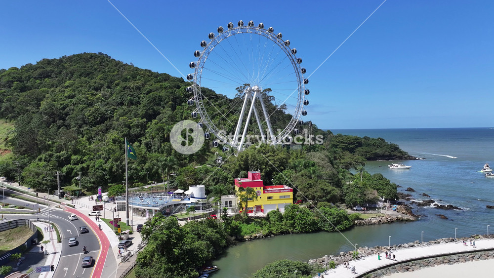 Balneario Camboriu, Santa Catarina, Brazil - 5.26.2025 - Balneario Camboriu Skyline At Balneario Camboriu In Santa Catarina Brazil. Aerial view of Ferris wheel dominating skyline of city.
