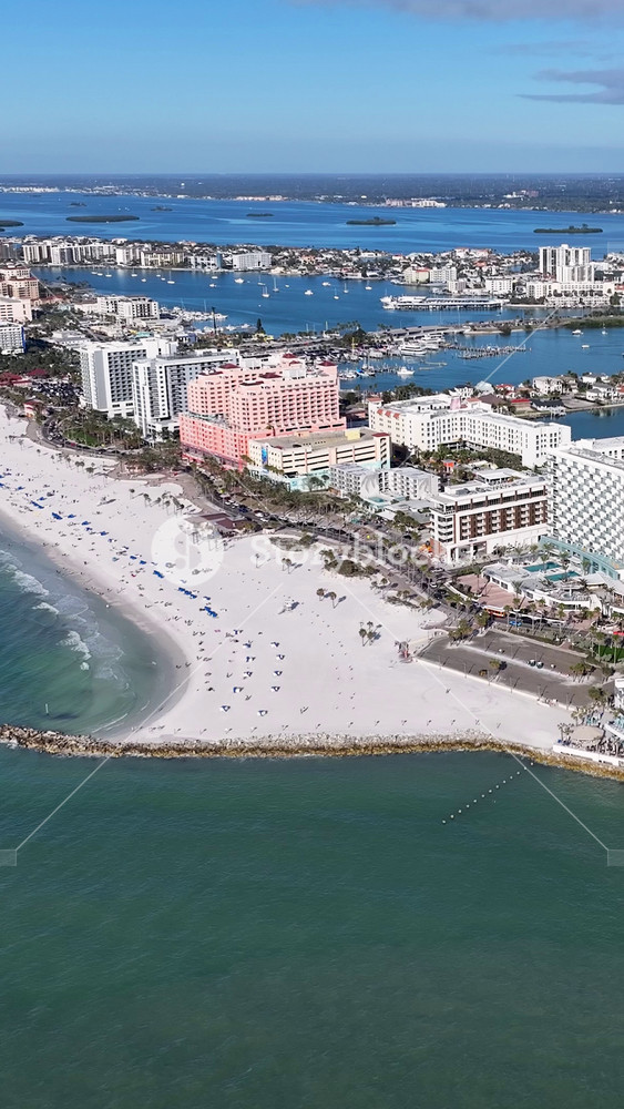 Clearwater Skyline In Clearwater Florida United States. Turquoise Ocean Waves Gently Crashing On Tropical Beach. Metropole Landscape Skyscrapers Beautiful. Metropole Urban. Clearwater Florida.